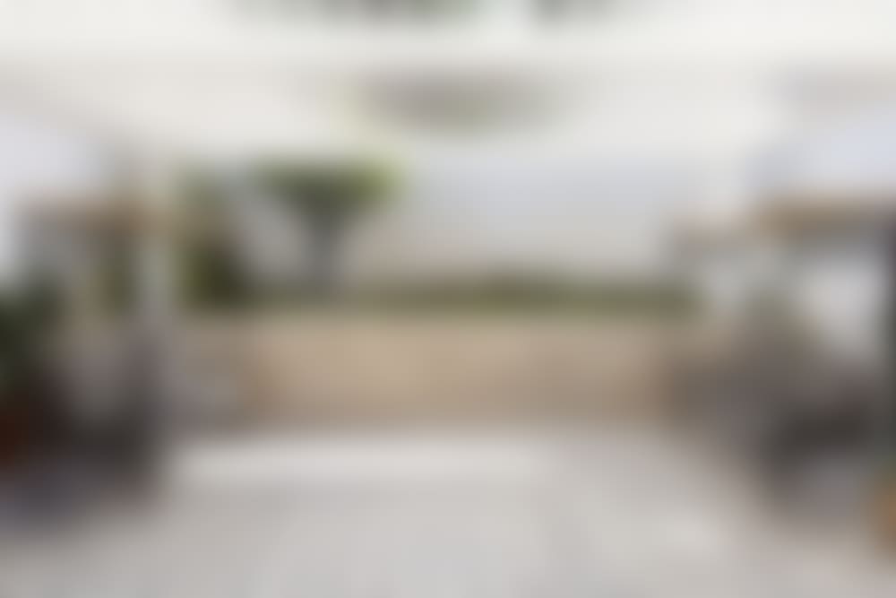 Another shady outdoor sitting area.